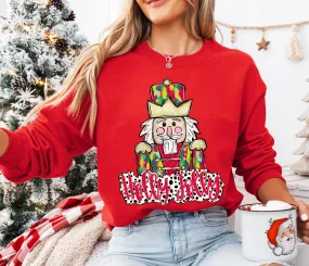 Holly Jolly Nutcracker Gildan or Bella Christmas Sweatshirt/ Direct To Film Transfered Faux Glitter Sweatshirt/ Youth and Adult Sizes