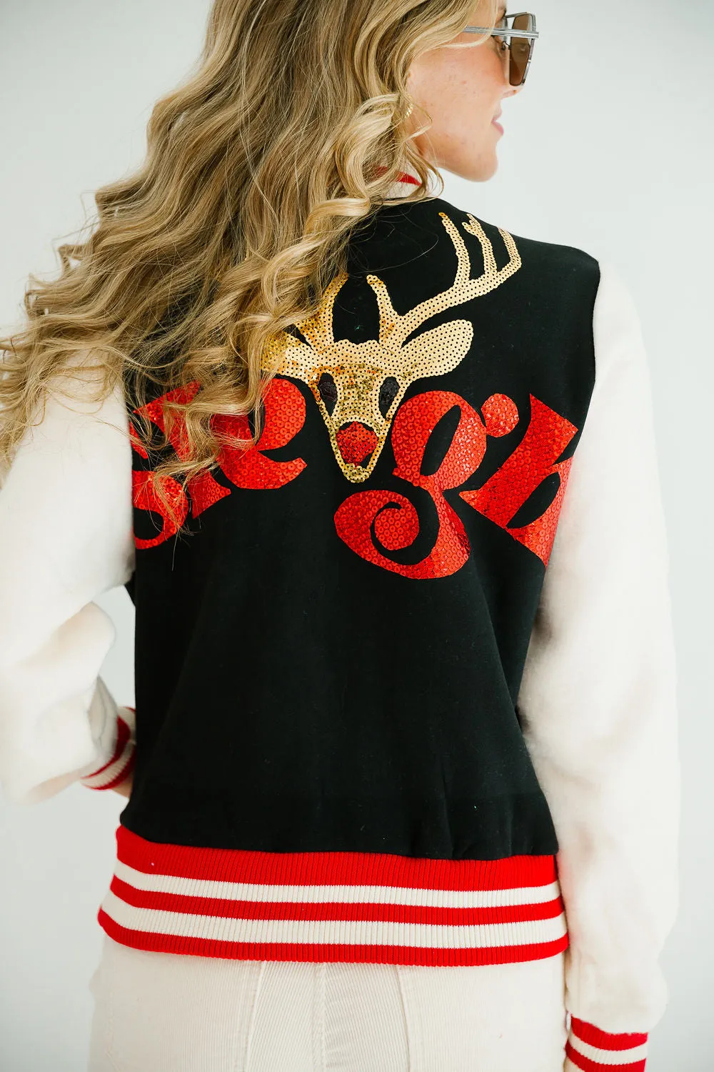 REINDEER SLEIGH BLACK VARSITY JACKET